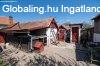 Elad csaldi hz Komdi kzpont