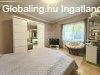 Elad� csal�di h�z Als�pet�ny, 	Erd� mellett