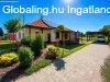Modern, energiatakar�kos otthon T�pi�szel�n ? parkos�tott ke