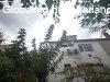 Lak�s gar�zzsal mell�k�p�lettel saj�t telekkel