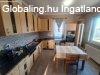 Pusztakov�csiban fel�j�tott, korszer�s�tett t�gla csal�di h�